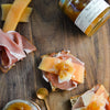 Pear mostarda paired with prosciutto and crostini